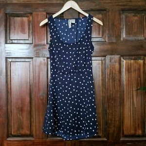 Mimi Chica navy blue polka dot open back dress